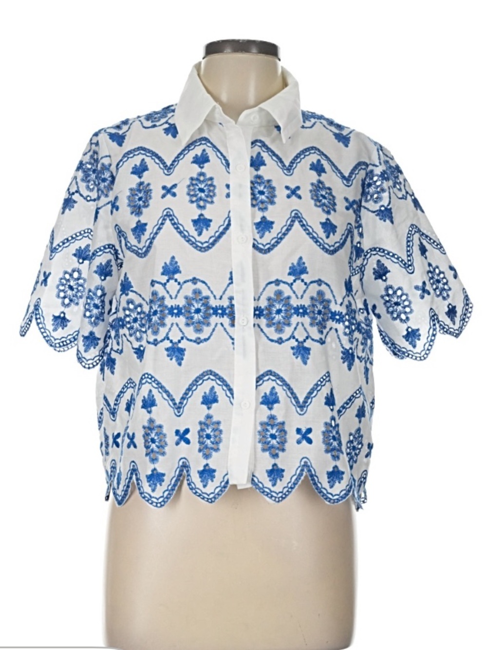 SHEIN White Blouse with Blue Embroidered Floral Design